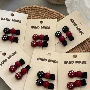 Cute polka dot round hair clips set in red and black colors for girls and women
