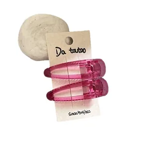 Pair of sweet translucent pink water drop hair clips on a display card for girls