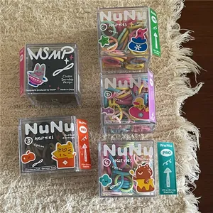 Macro shot of high-elasticity seamless hair bands set in transparent cartoon box