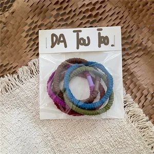 Detail of high-elasticity spiral hair ties in various colors with display card