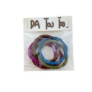 Five-piece set of cream-colored pleated elastic hair bands in various pastel colors