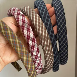 Padded diamond pattern headbands in various colors including olive, wine red, and navy blue