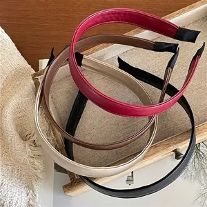 Minimalist stitched PU leather headbands in red, brown, beige, and black colors