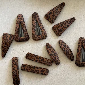 Chic leopard print fabric snap hair clips in assorted geometric shapes for women