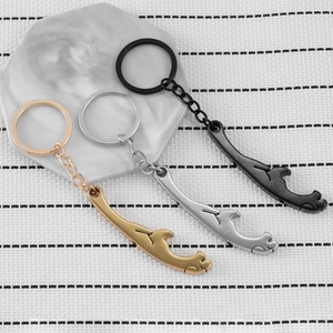 Leopard shaped stainless steel bottle opener keychain in gold, silver, and black colors