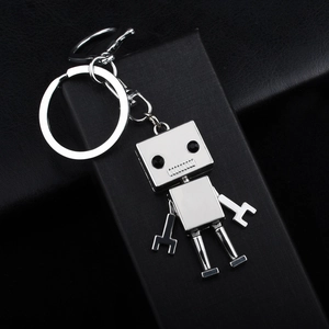 Porte-clés robot en métal argenté poli avec yeux en pierre noire et mousqueton