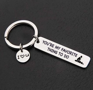 Detail view of funny stainless steel keychain with I Love You and humor text engraving