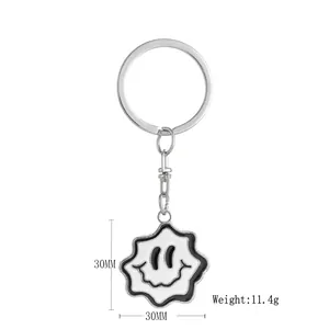 Détail du pendentif fantôme ondulé souriant avec dimensions 30mm et poids de 11,4g
