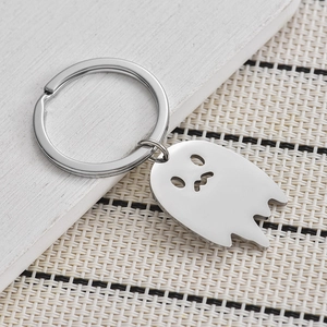 Minimalist silver ghost pendant keychain made of polished stainless steel for car and bags