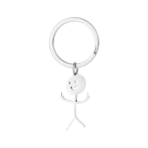 Close-up of funny doodle stickman keychain with middle finger gesture in silver stainless steel