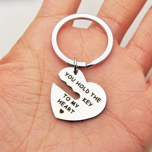 Silver stainless steel heart keychain engraved with You Hold The Key To My Heart