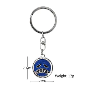 Anime rotating blue glitter emoticon keychain with 23mm diameter and 12g weight