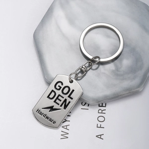 Silver military dog tag keychain with Golden engraving and lightning bolt icon