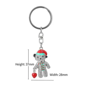 Süßer Weihnachts-Teddybär Schlüsselanhänger mit Strasssteinen und roter Mütze, 37mm x 28mm