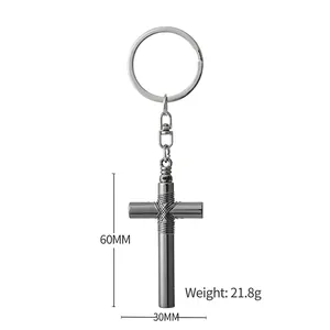 Creative silver cross whistle keychain with woven wire design and lobster clasp detail