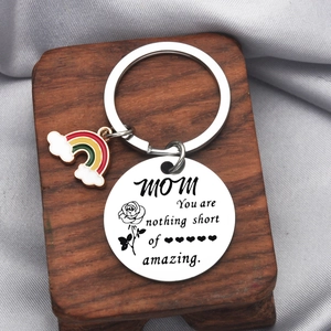 Detail of MOM stainless steel keychain with rainbow charm and rose engraved text