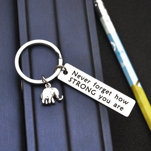 Elephant charm keychain with Never forget how STRONG you are engraving on stainless steel