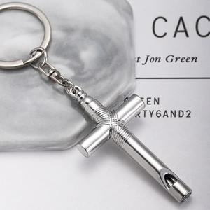 Creative silver cross whistle keychain with sleek metal finish for bags and keys