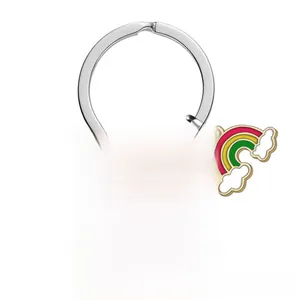 Macro detail of MOM stainless steel keychain with rose engraving and rainbow charm