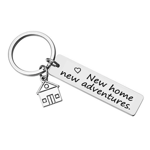 Polished stainless steel house keychain with New home new adventures engraving