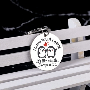 Polished stainless steel penguin heart keychain with I Love You A Lottle engraving