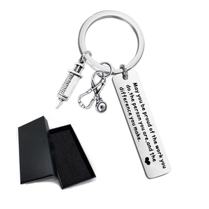 Nurse appreciation gift set featuring stainless steel medical charms in a black box