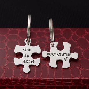 Creative sun and moon puzzle keychains for couples in a gift box, stainless steel finish
