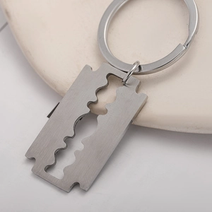 Punk style stainless steel razor blade keychain with brushed silver finish for bags
