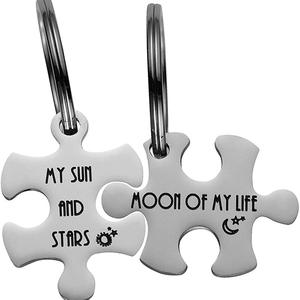 Creative puzzle keychain set for couples featuring Sun and Moon laser engraved metal design