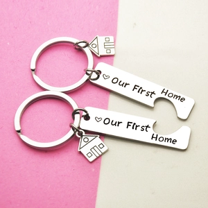 Stainless steel 'Our First Home' couple keychain set with mini house charms