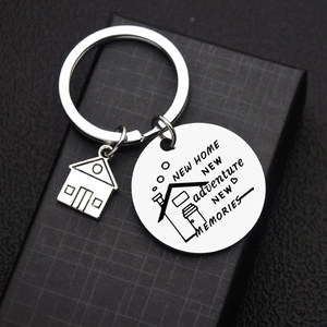 Silver stainless steel house keychain with engraved New Home New Adventure message