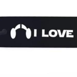 Black rectangle stainless steel keychain with I LOVE text and headphone icon