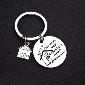 Polished stainless steel house keychain with engraved New Home New Adventure circular tag