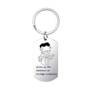 Close-up of Frankenstein graphic on polished stainless steel dog tag keychain