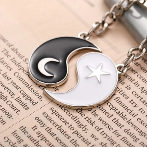 Retro Tai Chi Yin Yang pendant with star and moon charms on silver alloy keychain