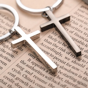 Minimalist 3D cross stainless steel keychain in silver and gunmetal finish