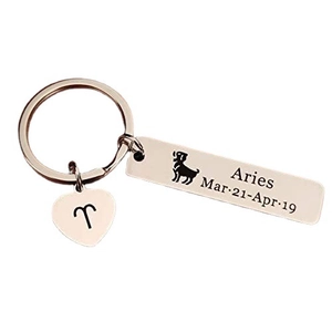 Rose gold stainless steel Aries zodiac keychain with heart charm and date tag