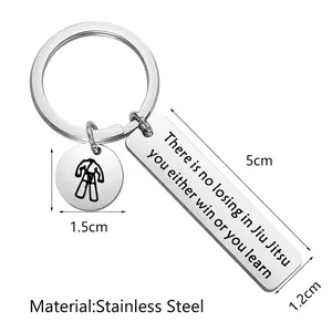 Jiu Jitsu stainless steel keychain with engraved motivational tag and uniform pendant