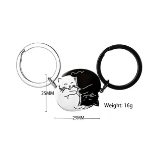 Creative black and white cat puzzle keychain set in stainless steel yin yang design