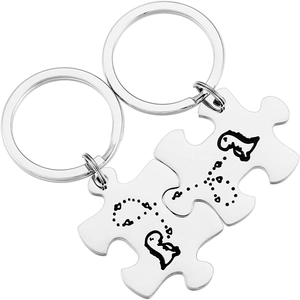 Dinosaur puzzle keychain set for couples in polished silver stainless steel finish
