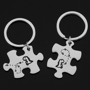 Matching dinosaur puzzle keychain set in stainless steel for couples and friends