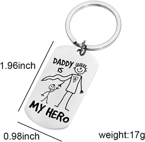 Close-up of DADDY IS MY HERO engraving on polished stainless steel dog tag keychain