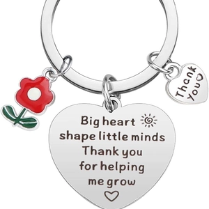Teachers Day gift keychain with red flower and engraved heart pendants on white background