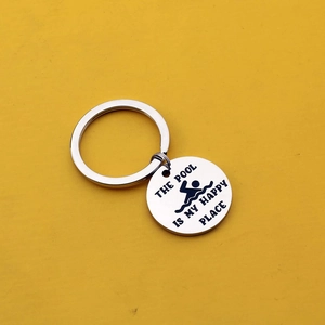 Stainless steel keychain with The Pool is My Happy Place engraving on yellow background