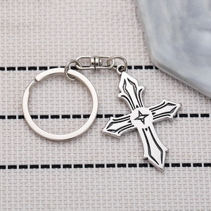 Retro gothic cross metal keychain in silver finish with lobster clasp and star detail