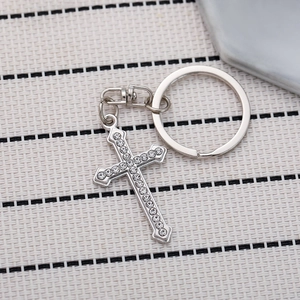 Elegant silver cross keychain with sparkling rhinestones for handbags and car keys