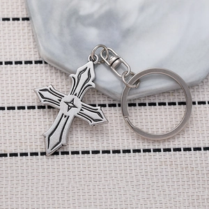 Retro gothic cross keychain in vintage silver finish with star relief and spring clasp