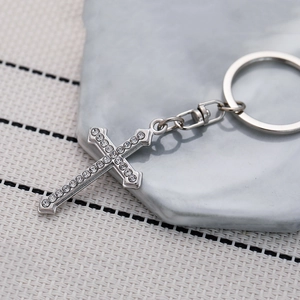 Elegant silver cross keychain with sparkling rhinestones for handbags and keys accessories