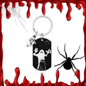 Halloween ghost keychain featuring black metal tag and white phantom charm for backpack