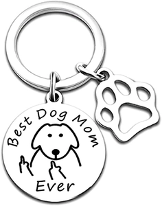 Close-up of Best Dog Mom Ever keychain with funny dog illustration and hollow paw charm
